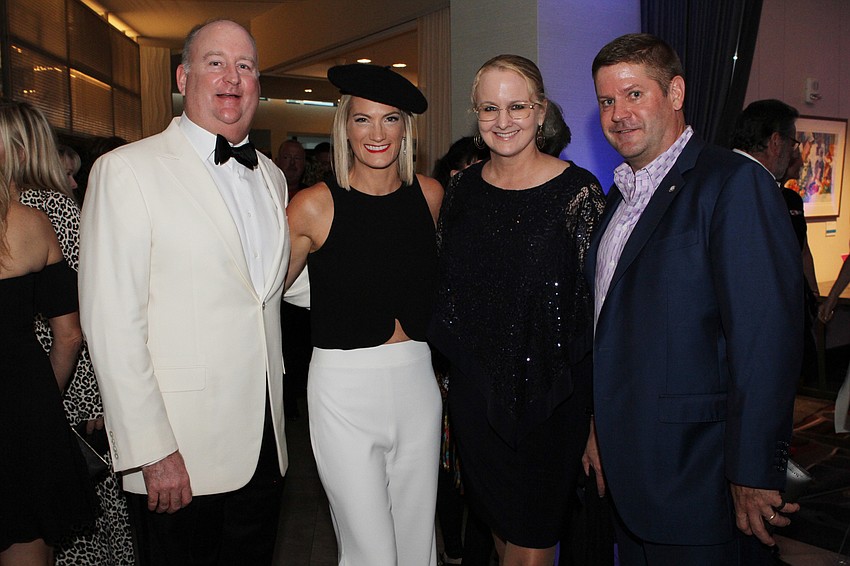 Drayton and Kara Saunders with Dr. Sarah Hoffe and Dan Hoffe