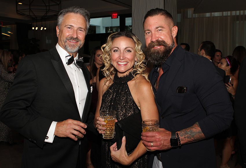 Scott Stone with Nicole and Dan Starostecki