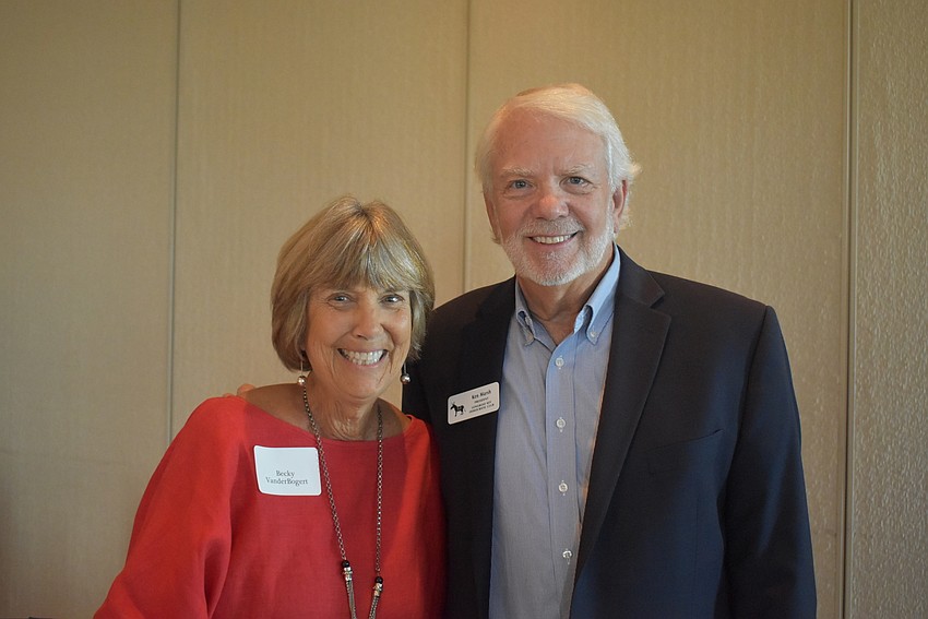 Becky VanderBogert, who organized the event, and club President Ken Marsh.