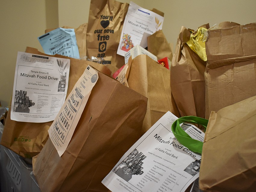 Temple Emanu-el raises food for All Faiths Food Bank each Yom Kippur.