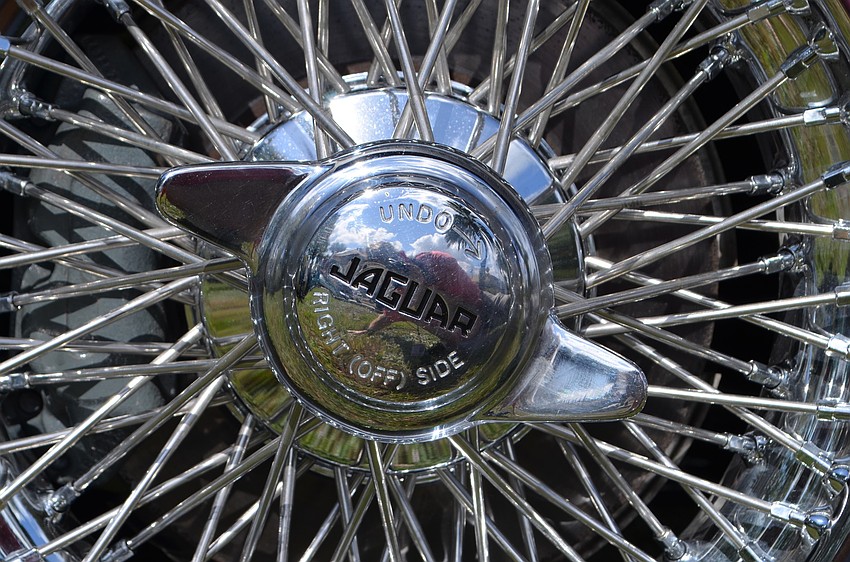 Wire wheels and a classic spin-off hub are among the features for which Jaguars are known.