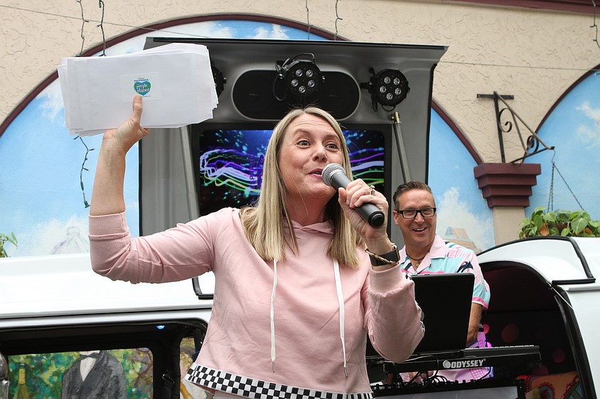 Director of Development Mary Ellen Mancini relayed instructions to the teams.