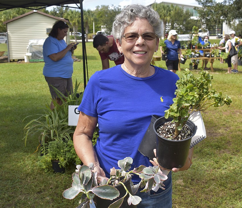 Linda Goldstein-Diaz shows off her plants.