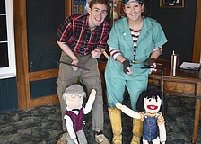 Will Stapleton and Reilly O'Connell pose with the marionettes before the children arrive.