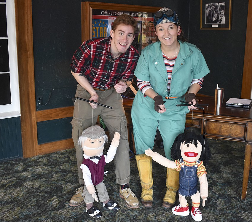 Will Stapleton and Reilly O'Connell pose with the marionettes before the children arrive.