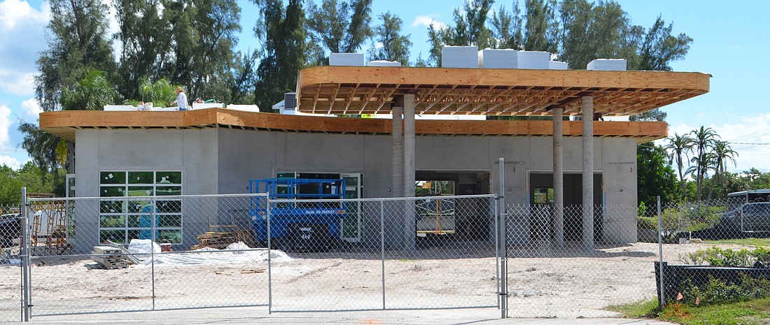 Whitney&#39;s outdoor seating will be situated under the new canopy constructed on the front of the building.