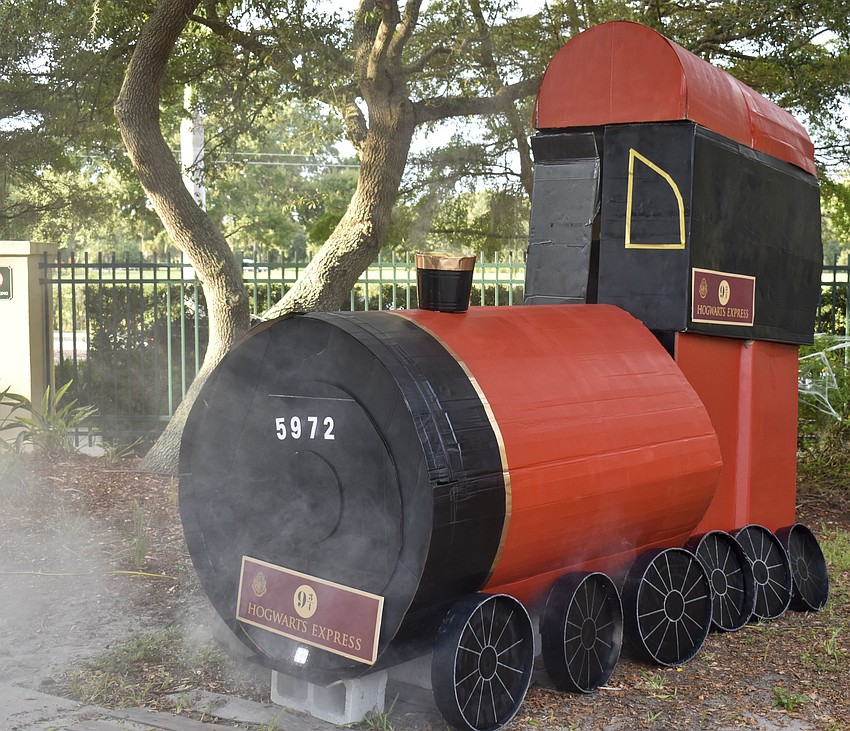 The Hogwarts Express welcomes guests as they enter the stadium.