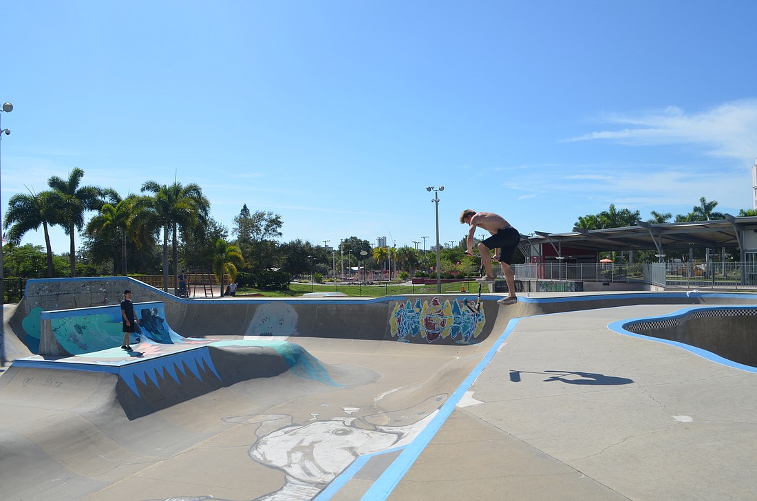 Zach Farley rides a scooter at Payne Skate Park on Tuesday, Oct. 15.