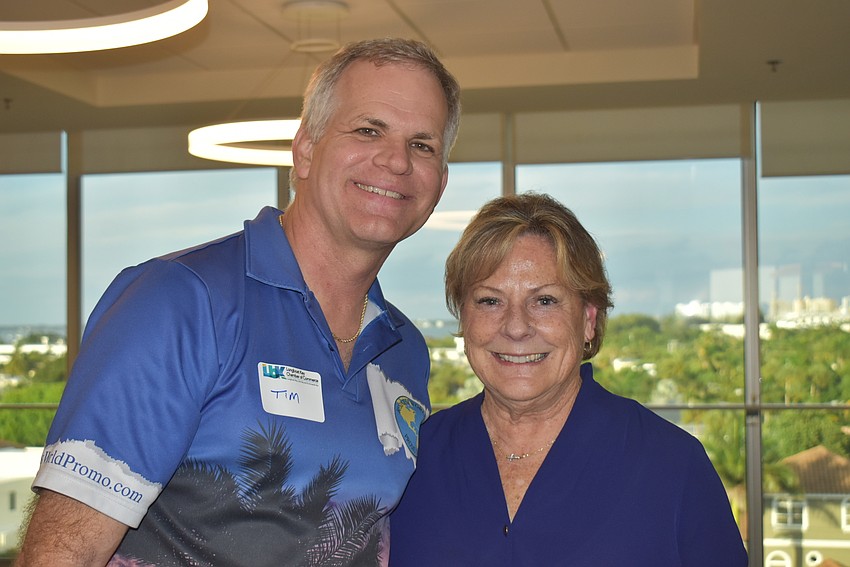 Tim Holliday and Chamber president Gail Loefgren.