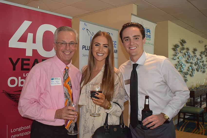 Small Business Week chair Mike Vejins, Audrey Modglin and Robert Garcia.