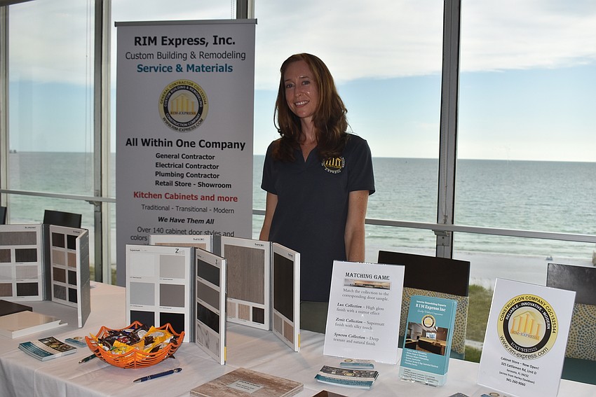 Rebecca Figueroa stands ready at her table.