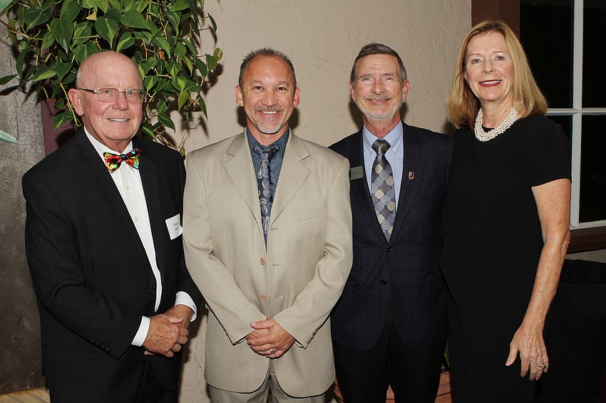 Honorees Charles Slater and Kevin Henault with President and  CEO Bob Rosinsky and Adell Erozer