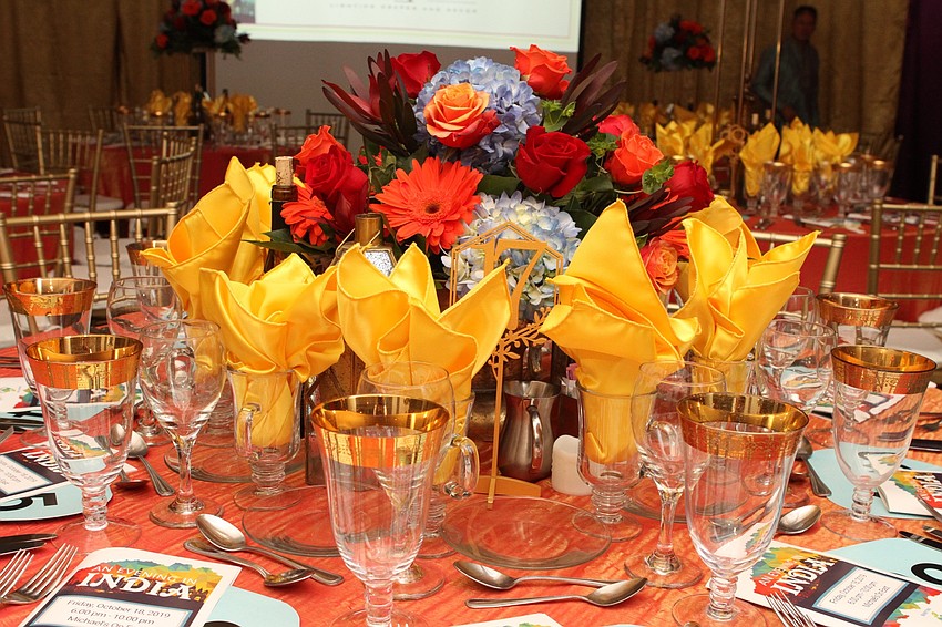Each table had some colorful floral decor.