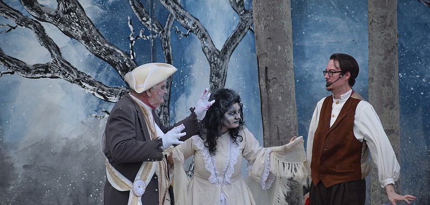 Major Andre (Peter Ruscoe) and the Woman in White (Yvonne Clark) put some unworldly pressure on Ichabod Crane (Philip Troyer).