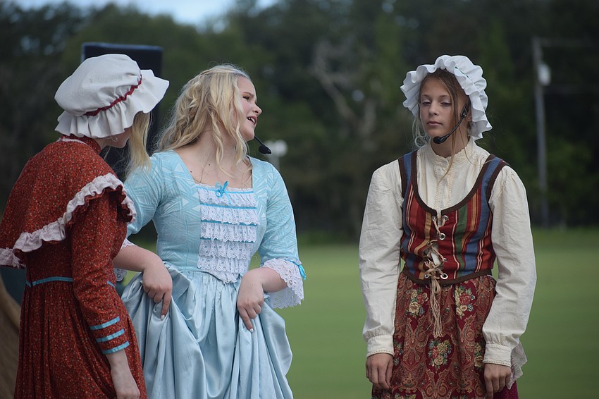 Hilda (Annabelle Pietryka), Katrina Van Tassel (Hannah Doster) and Greta (Kylie Pietryka) discuss nerdy Ichabod Crane.