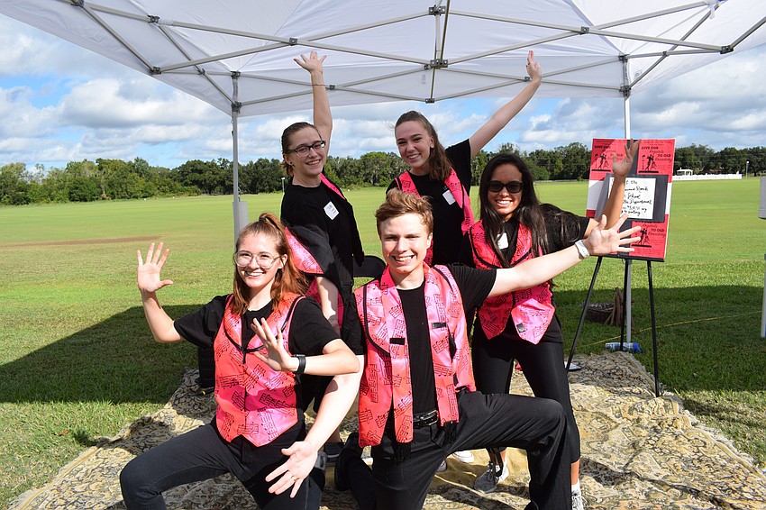 Members of the Lakewood Ranch High theater group include (back row) junior Lora Brasfield and senior Lily Adamson and (front row) seniors Audrey Dixon, J.T. Girman and Fefe Paredes. They did a sing-along at the event.