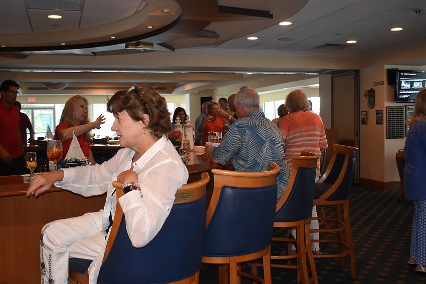 Despite the venue change, the event drew about 60 members.