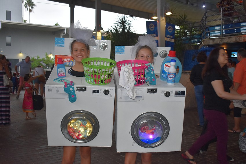 Olivia Inda and Ava Baugh dressed as washing machines.