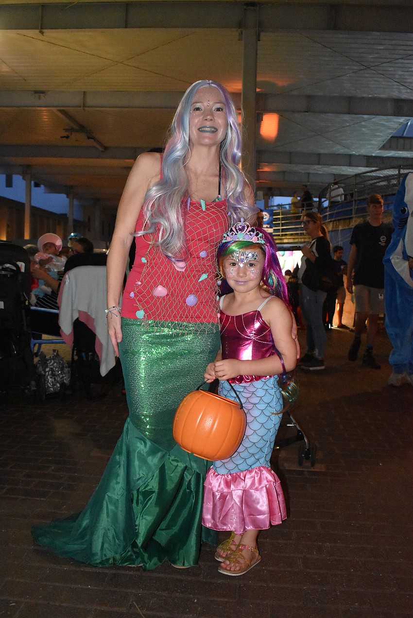 Carrie and Allie Wojcik in their mermaid costimes.