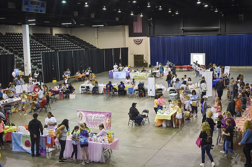Patrons wander around the Slime Blowout Festival.