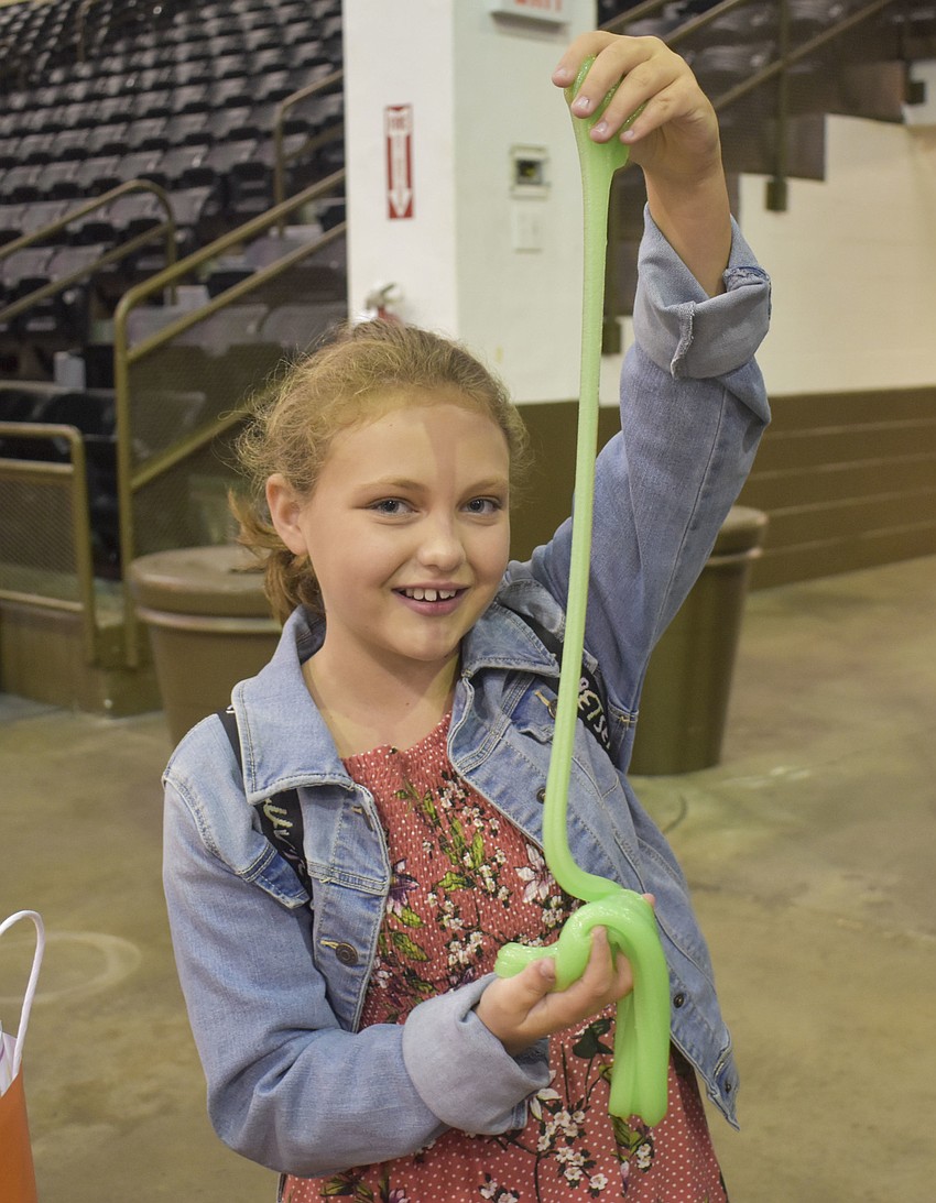 Julia Lasota, 10, shows off her green slime.