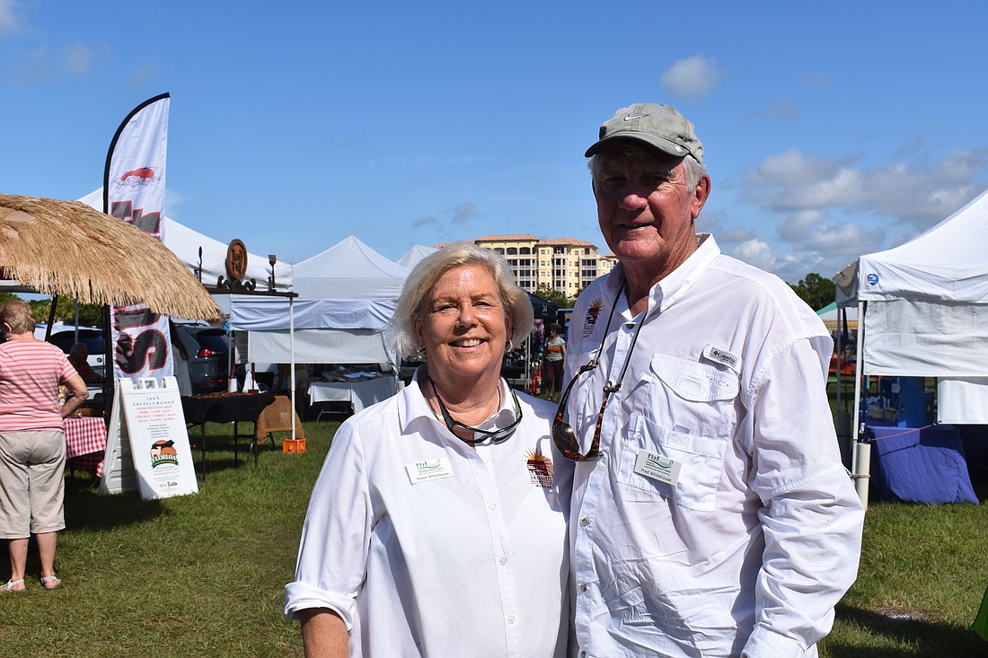 The Whitehouses have been volunteering at the Phillippi Farmhouse Market for a collective 17 years. Fred, who is the market manager, has been there for 11 years and Grace, who runs the welcome tent, has volunteered there for six.Â