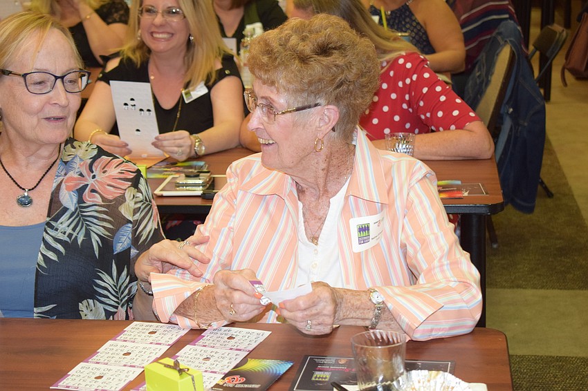 Bradenton's Nadine O'Connor won the first Bingo game of the night to claim a designer purse.