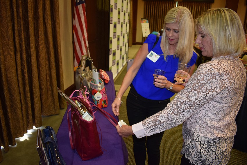 Bradenton's Ellen Peacock and Dade City's Monica Litrico joined five other friends for a girls night out at the event.