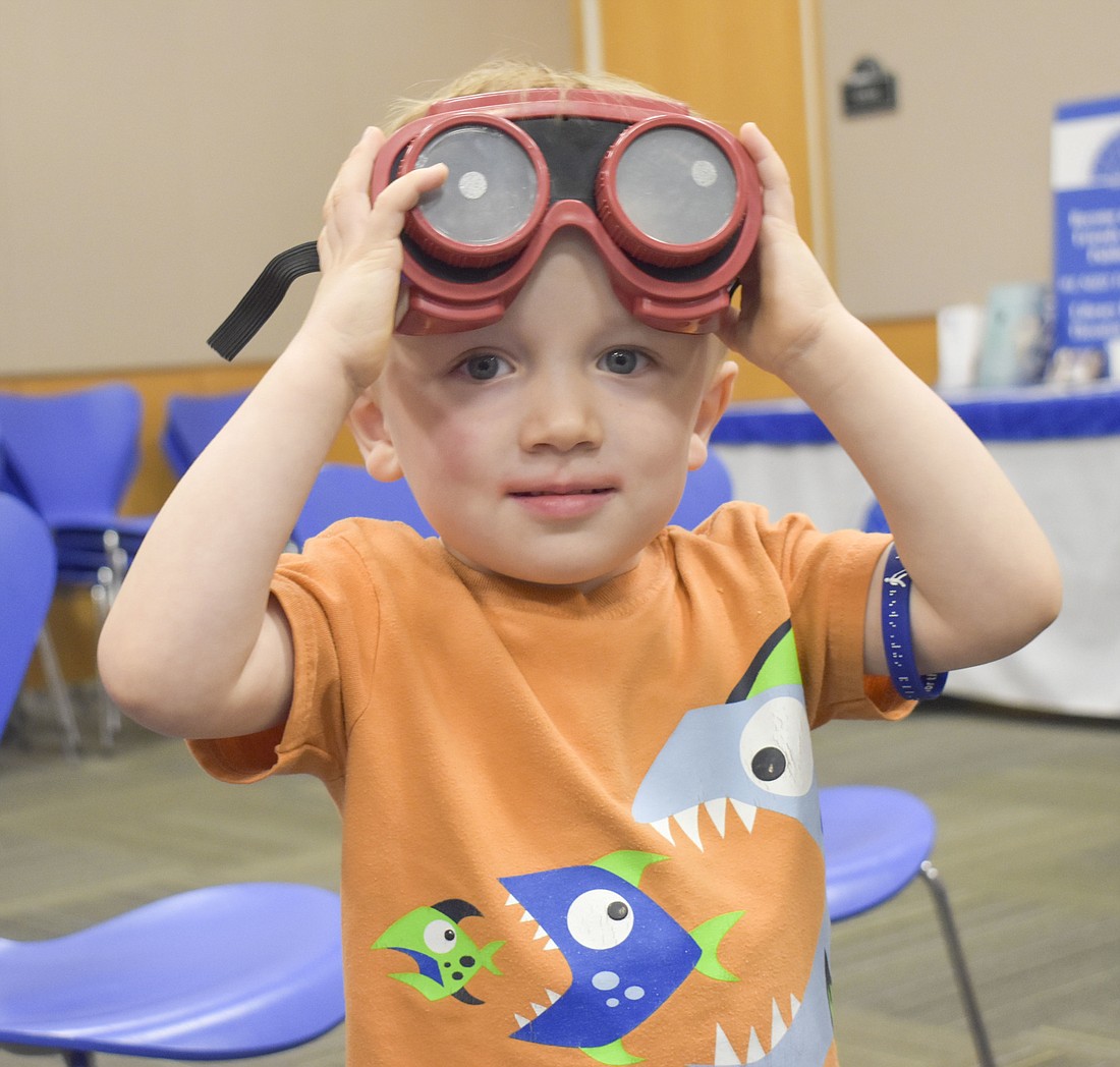 Your Observer Photo Kylo Phillips, 3, tries on a pair of vision