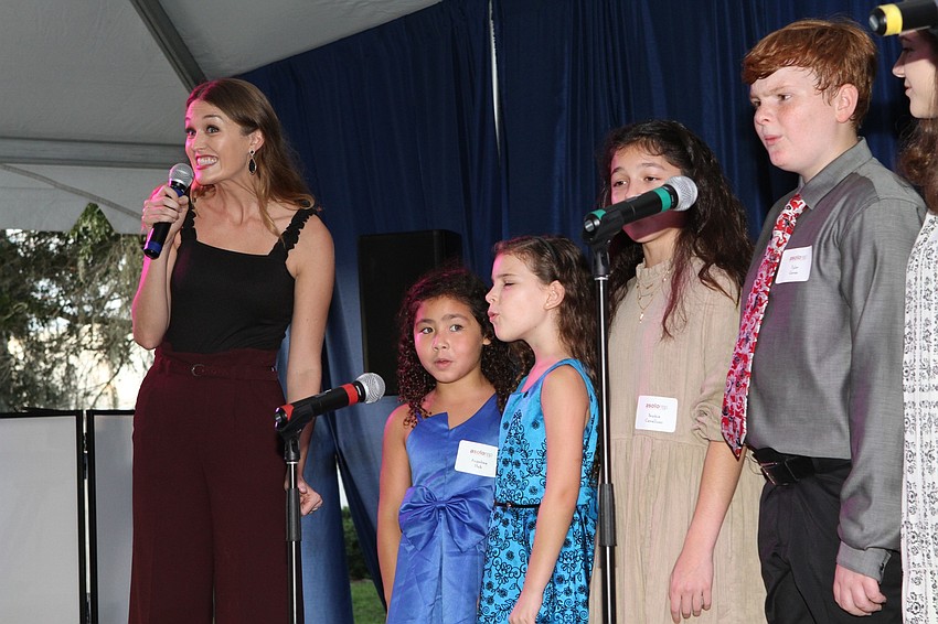 Maddie Shea Baldwin led the young performers in 