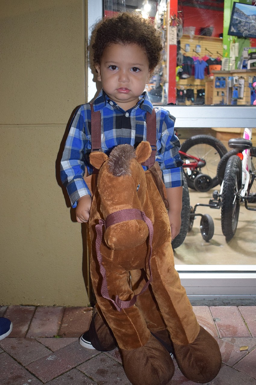 A cowboy costume was the only one Sarasota resident Emmett Yong, 2, would pick.