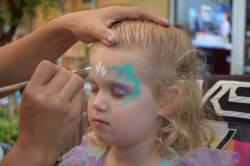 Lakewood Ranch resident Avery Scherzer, 3, has her face painted to match her Ariel from 