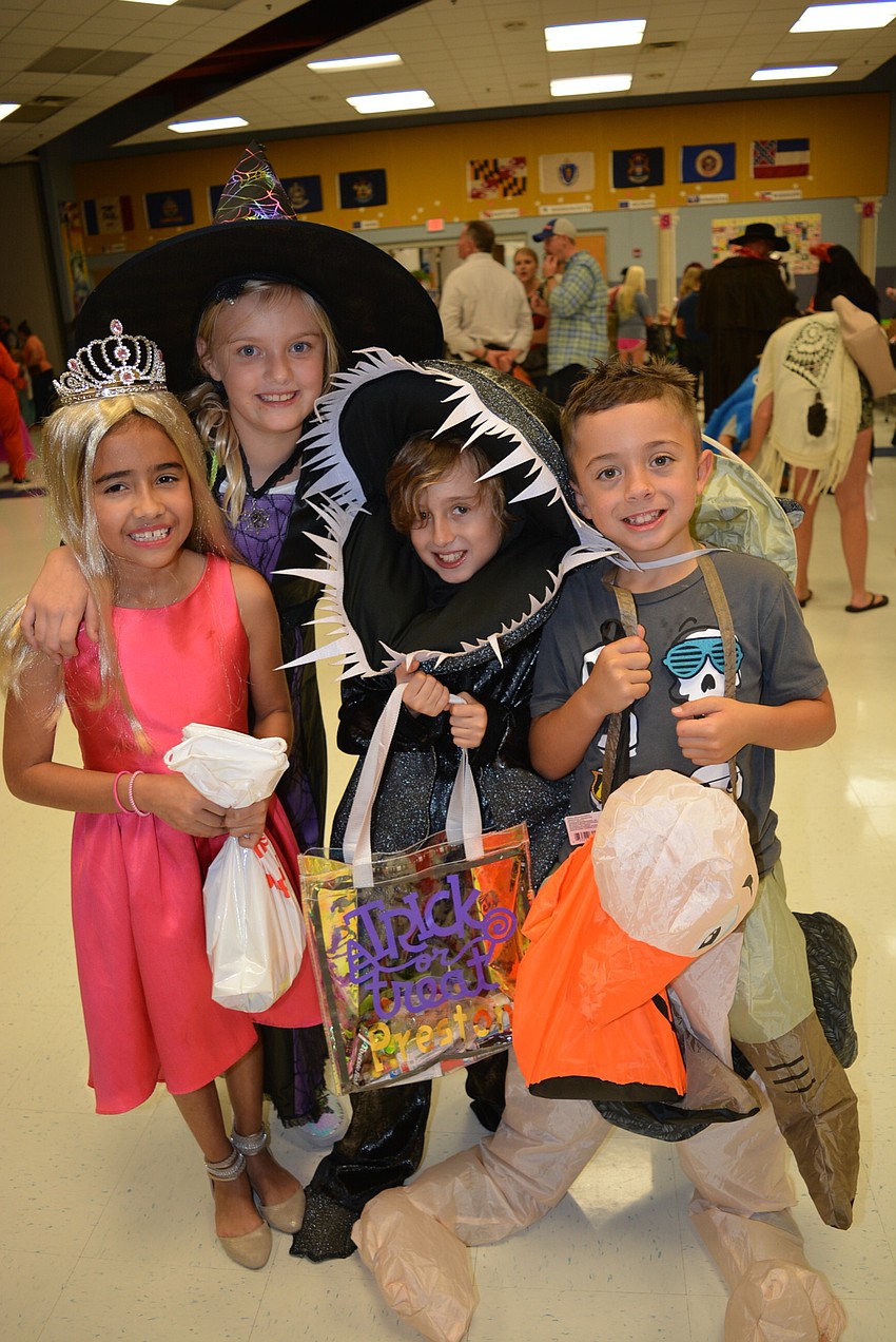 Sorayma Escamilla, Olivia Drobny, Preston Hafner and Van Ayala are all in the same third-grade class.