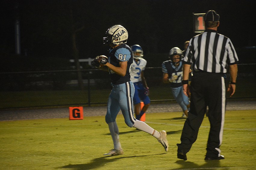ODA senior Colin Castro celebrates as he crosses the goal line.