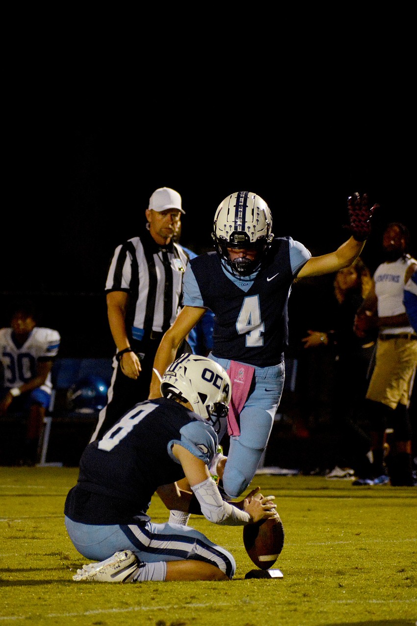 ODA freshman Matt DePalma (4) makes an extra point.