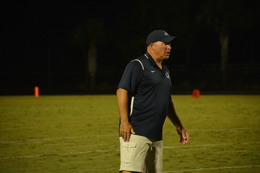 ODA coach Chris Kempton gives instructions from the sideline.