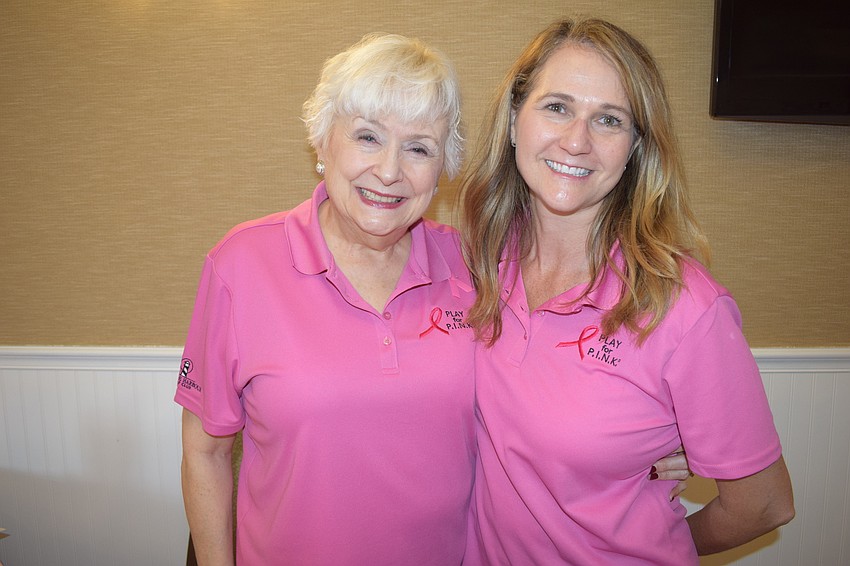 Stoneybrook's Sheri Miller and Greenfield Plantation's Julie Veith were checking in golfers before the tournament.