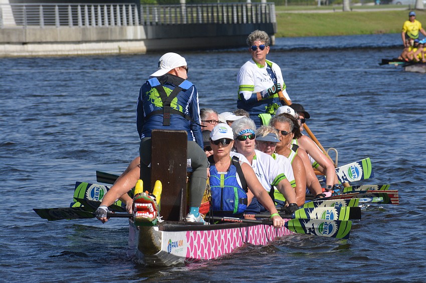 The NBP Dragons 500m premier/senior mixed 20 team paddles back to the dock after finishing fourth in its qualifying heat (2:26.50).