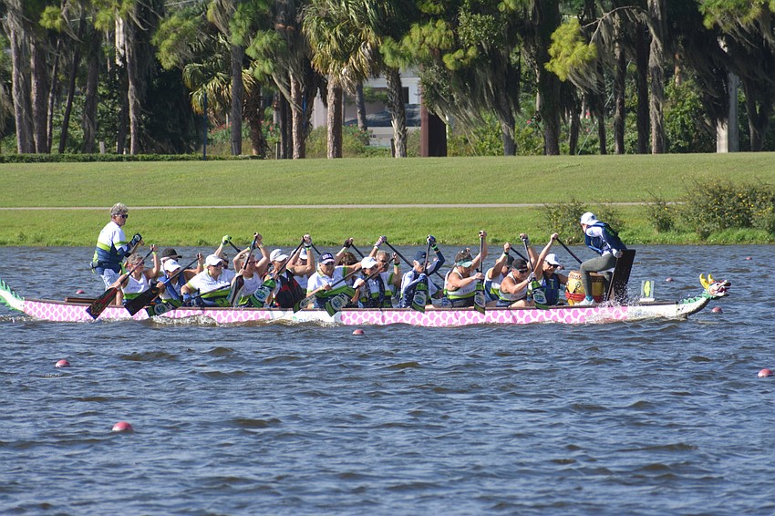 The NBP Dragons 500m premier/senior mixed 20 team goes hard to the finish line. The team would finish fourth in its qualifying heat (2:26.50).