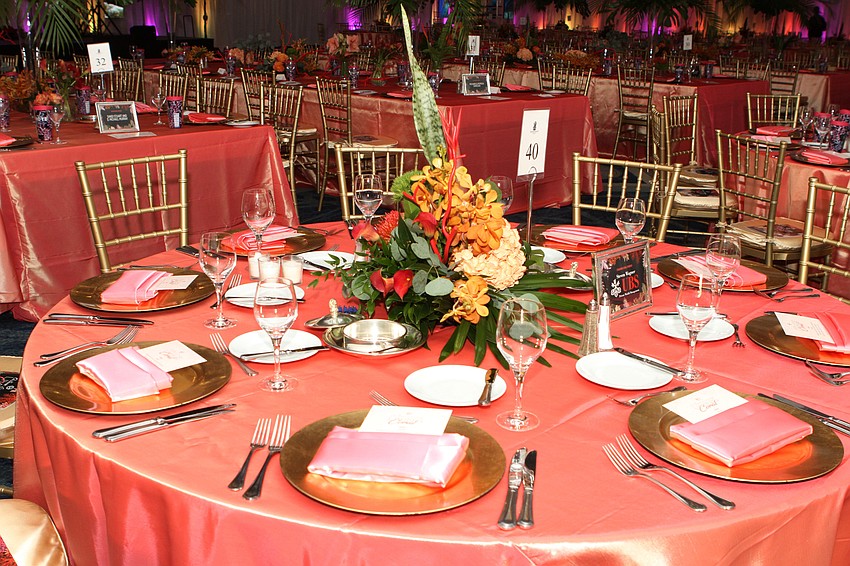 The ballroom had pink, coral-themed decor.