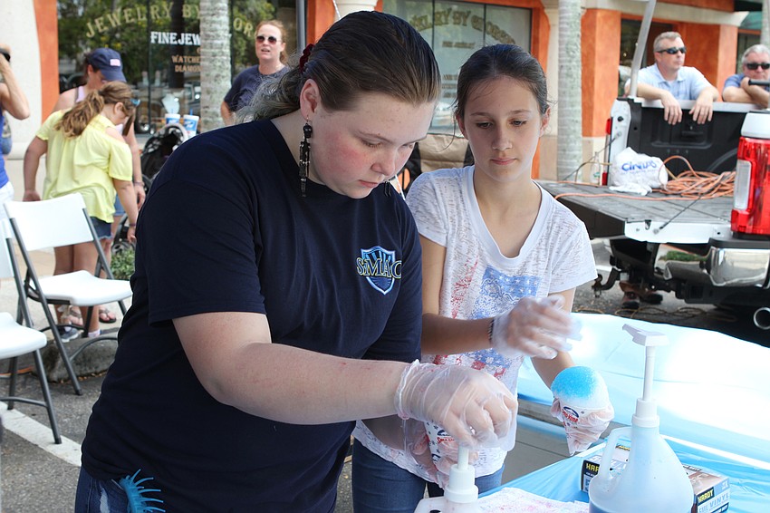 Faith Girll and Ava Wasilewski made snow cones.