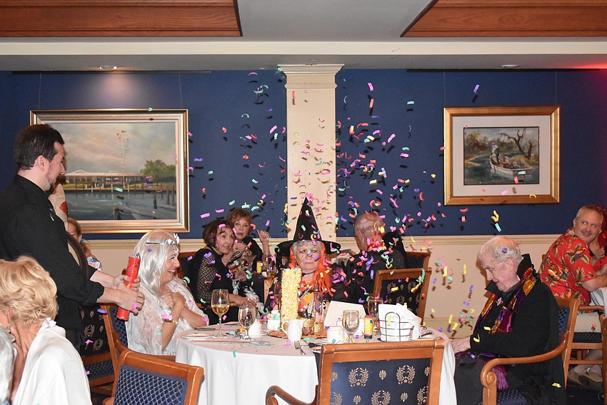 Confetti poppers shot off to the surprise of others.