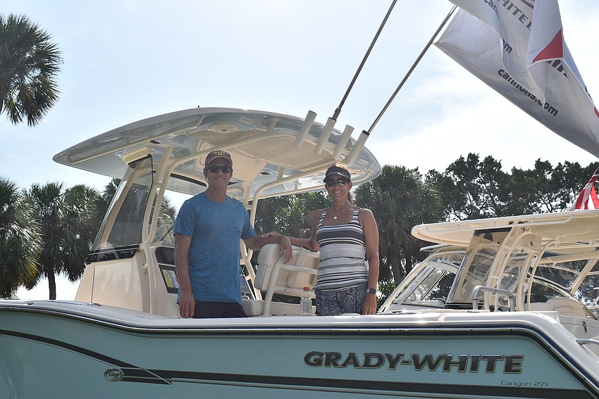 Scott and Amy Franklin aboard onshore.