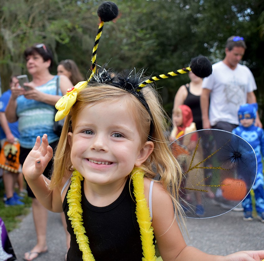 Andromeda Rhea, 4, shows off her bumblebee costume.