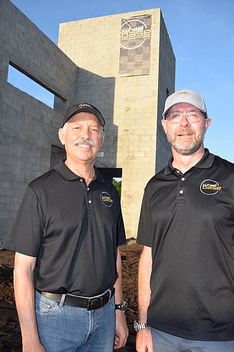 Wheel Base owners Dennis Brozak and Hans Schmeits say their garage condos project is the first of its kind in the region.