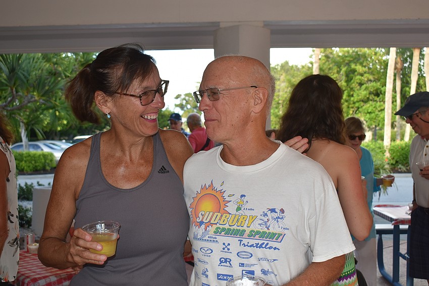 Mary Jane Waite and Andrew Geller share a laugh.
