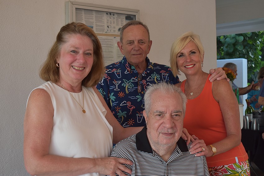 Tina and Ken Grubich with Bob and Teresa Simmons.