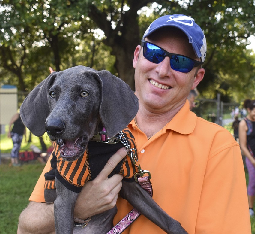 David Dessauer poses with his dog Little Miss Sugar Bee.