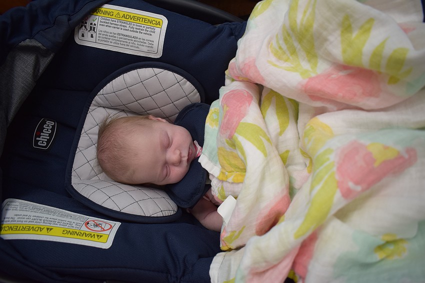 East County's Isla Olson, who was born Oct. 13, was worn out before the parade.