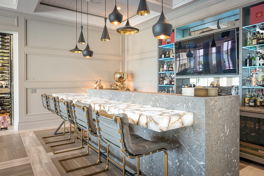 The home offers a lounge with an illuminated crystal agate countertop bar. (Photos courtesy: Premier Sotheby’s International Realty)